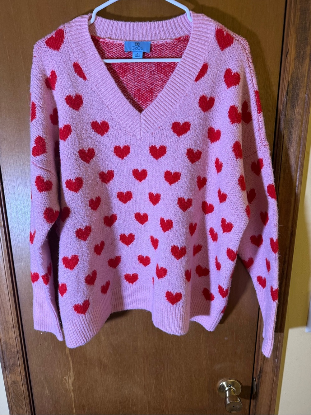 CeCe Pink V-Neck Sweater with Red Heart Motif
